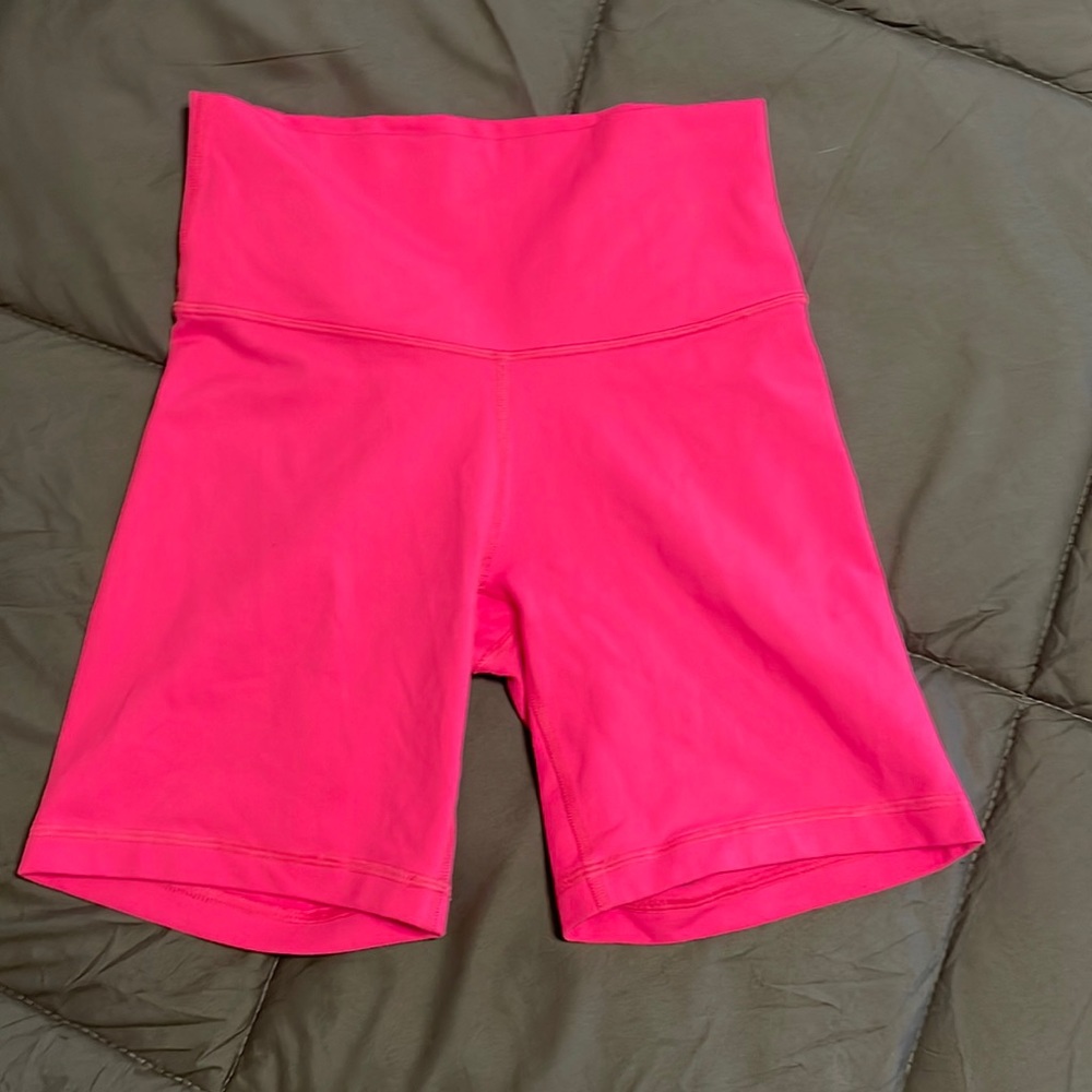Aritizia TNA neon pink workout shorts